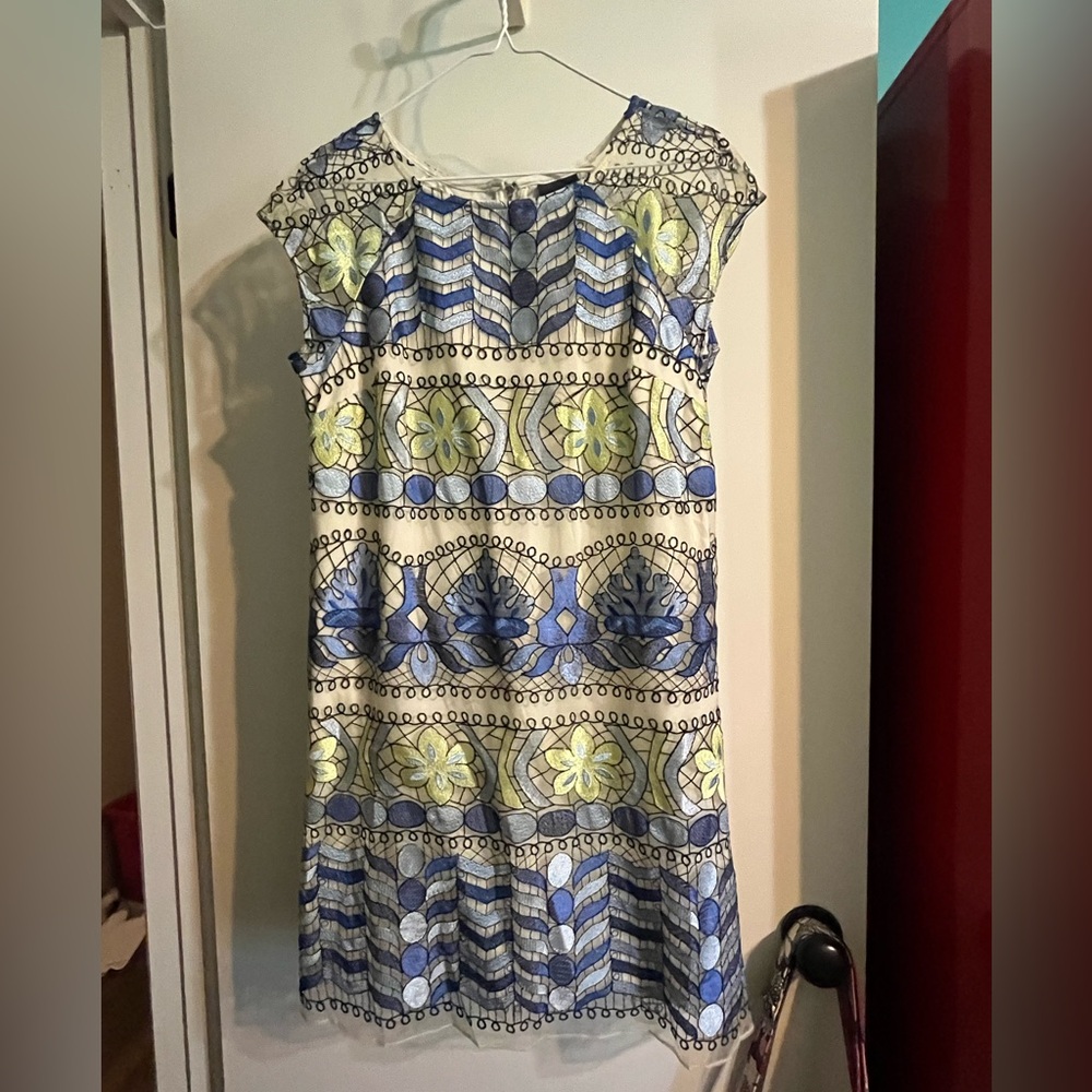 Eci size 4 dress. Sleeveless and fully lined.  I call the pattern stained glass.